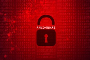 A GLOWING RED SCREEN SHOWSCOMPUTER  BITS AND BYTES, WITH THE WORD RANSOMWARE AT THE CENTER