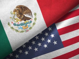 MEXICO and US FLAGS iStock-Oleksii Liskonih