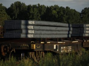 STEEL BEING TRANSPORTED ON A TRAIN CREDIT BLOOMBERG.jpg