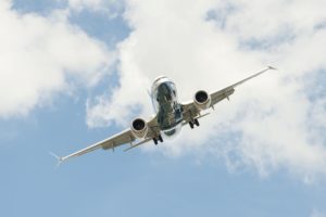 A BOEING 737 MAX AIRCRAFT FLIES INTHE SKY