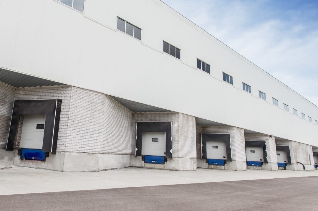 A WAREHOUSE EXTERIOR with TRUCK DOCKS.jpg