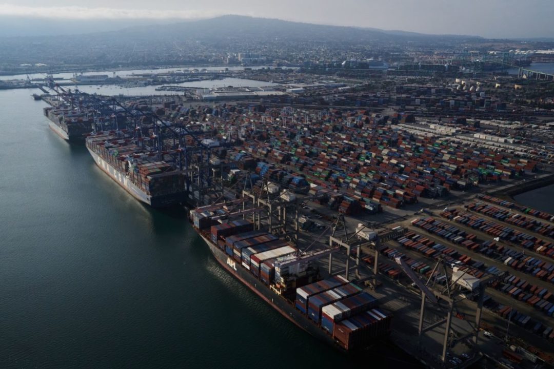 Container ships dock at the Port of Los Angeles in Los Angeles, California