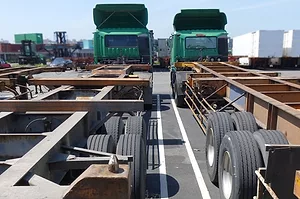PHOTO OF TWO TRUCK CHASSIS 