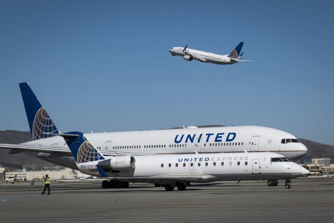 UNITED AIRLINES PLANES SIT ON THE TARMAC AT AN AIRPORT
