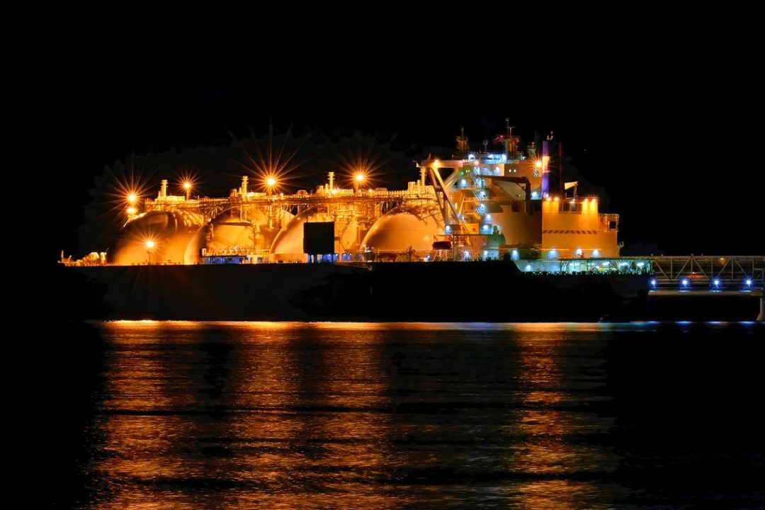 AN LNG TANKER DOCKED AT NIGHT 