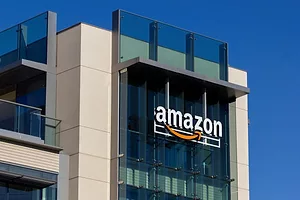 AN OFFICE BUILDING EXTERIOR BEARS THE AMAZON LOGO