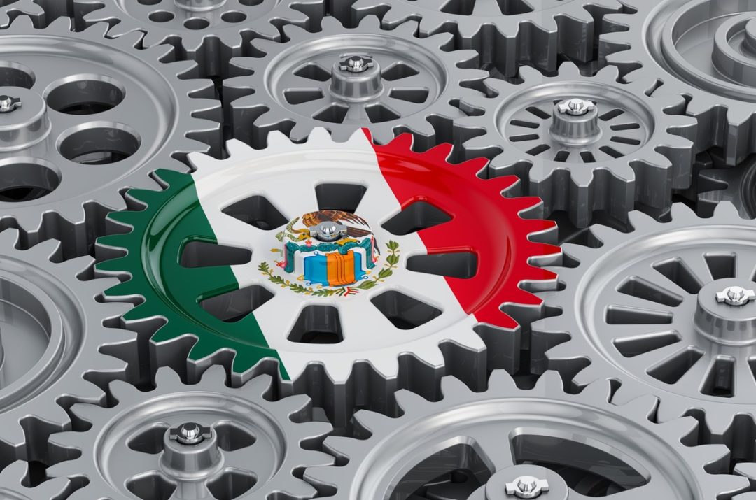 MANY COGS INTERACT TOGETHER, ONE PAINTED WITH THE FLAG OF MEXICOStock-natatravel-1261506189.jpg