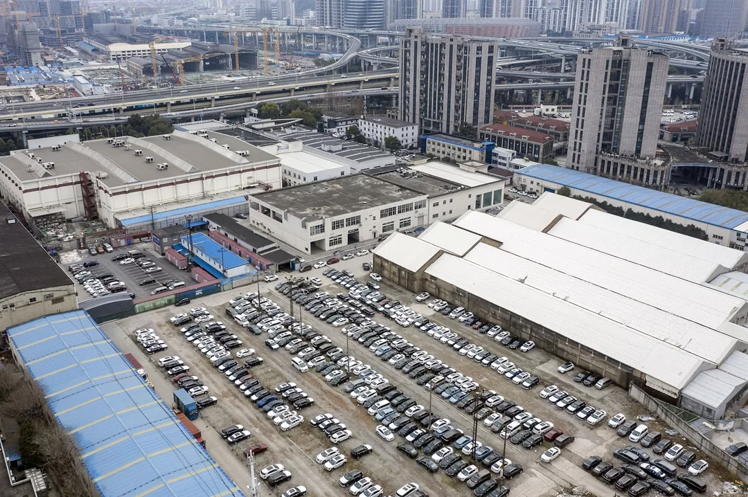 AN AERIAL PHOTO OF A LARGE CAR LOT