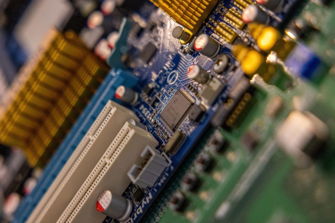 EXTREME CLOSE UP OF MICROPROCESSORS ON A CIRCUIT BOARD