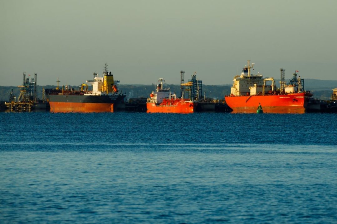 A CLUSTER OF OIL TANKERS AT SEA