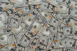 A CARPET OF DOLLAR BILLS