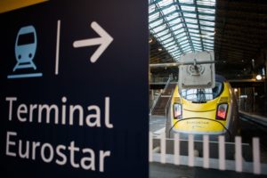 A LARGE SIGN AT THE HEAD OF A RAILWAY PLATFORM POINTS TO TERMINAL EUROSTAR