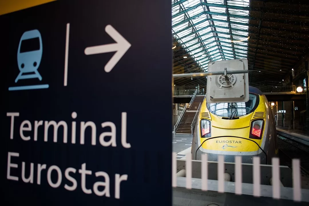 A LARGE SIGN AT THE HEAD OF A RAILWAY PLATFORM POINTS TO TERMINAL EUROSTAR