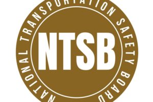 THE BROWN AND WHITE LOGO OF THE NATIONAL TRANSPORTATION SAFETY BOARD2981472.jpg