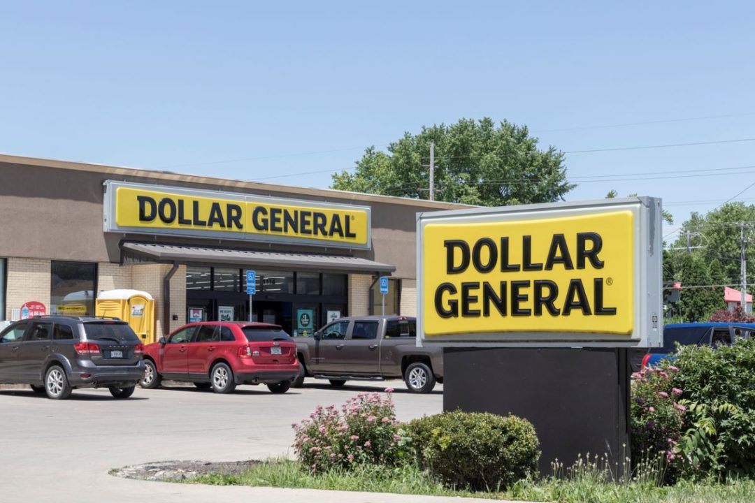 A STORE BEARING THE DOLLAR GENERAL LOGOS, CARS PARKED IN FRONT