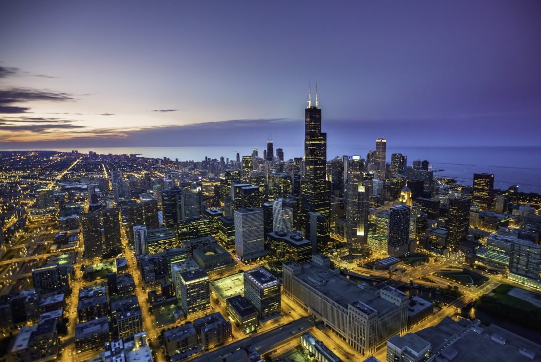 WIDE AERIAL PHOTO OF CHICAGO CITY SKYLINE AT NIGHT