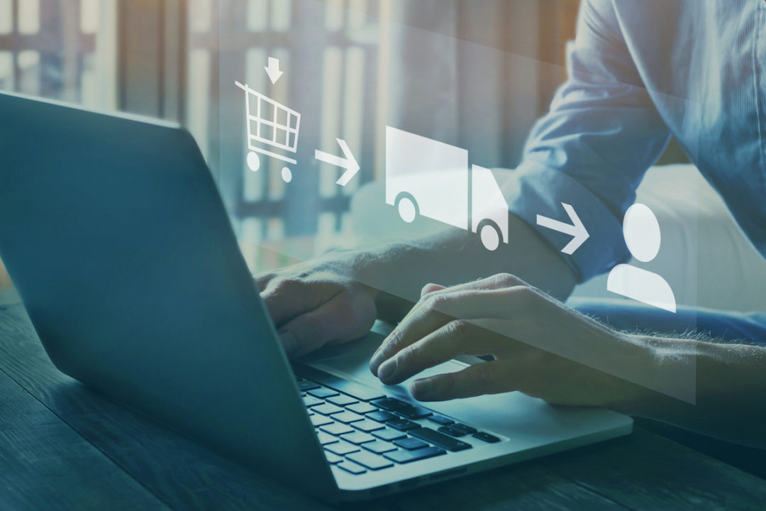 A person's hands are hovering above a laptop. Above the hands is an image of a shopping cart with an arrow pointing to an image of a delivery truck with an arrow pointing to an image of a person.