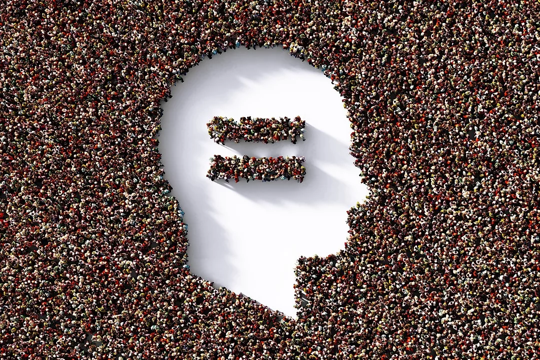 Human Head and Equal Sign Formed by Human Crowd on White Background