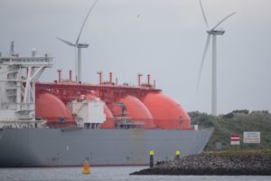AN LNG CARRIER AT SEA SPORTS THE TELL-TALE BULBOUS CONTAINERS FOR GAS VISIBLE ABOVE DECK