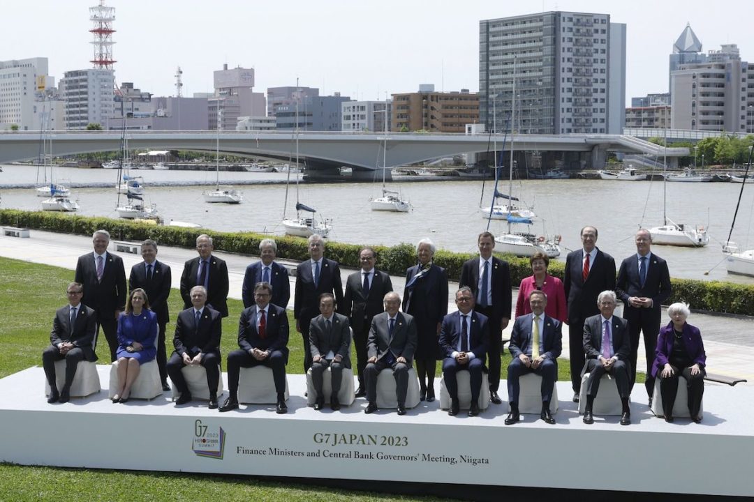 Group of Seven (G-7) finance ministers and central bank governors during a family photo session in Niigata. Photographer: Kiyoshi Ota/Bloomberg