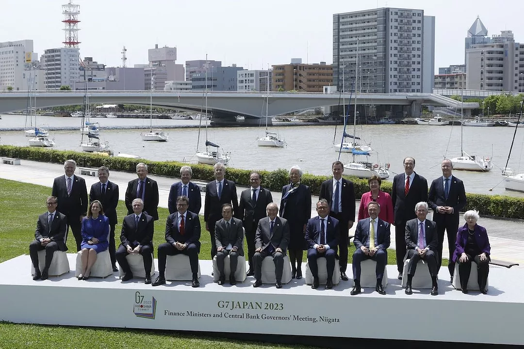 Group of Seven (G-7) finance ministers and central bank governors during a family photo session in Niigata. Photographer: Kiyoshi Ota/Bloomberg