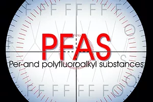 The letters "PFAS" with the words "per- and polyfluoroalkyl substances" are in the center of a visual scope. Photo: iStock.com/Francesco Scatena