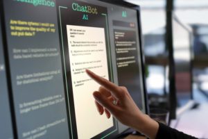 A HAND TOUCHES A SCREEN FULL OF TEXT, WITH THE HEADLINE CHATBOT AI