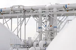 SEVERAL WHITE PIPES CAN BE SEEN ON A LIQUIFIED NATURAL GAS TANKER.