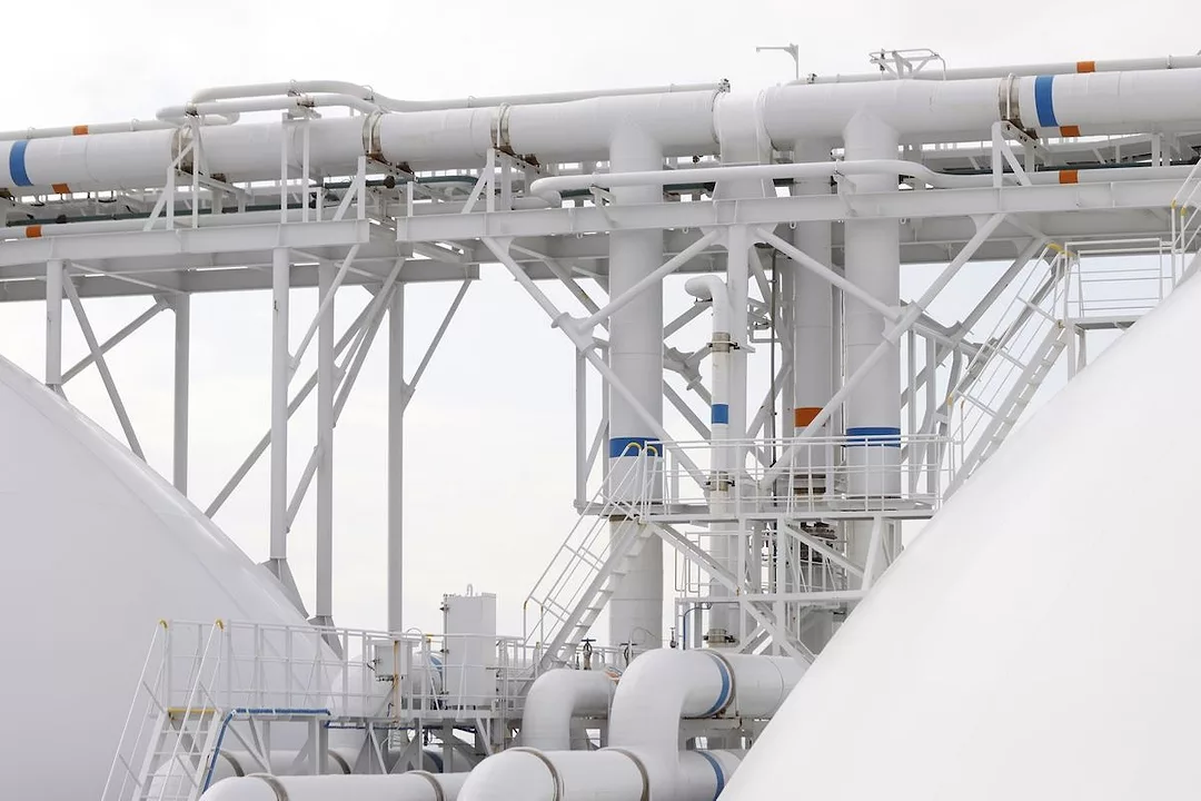 SEVERAL WHITE PIPES CAN BE SEEN ON A LIQUIFIED NATURAL GAS TANKER.