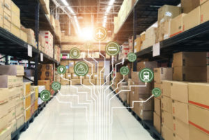 ICONES OF MARKETING AND PROCESSING CHANNELS ARE CONNECTED BY SEVERAL WHITE LINES LEADING TO THE BOTTOM OF THE IMAGE. THE SYMBOLS HOVER IN FRONT OF SHELVES IN A WAREHOUSE.