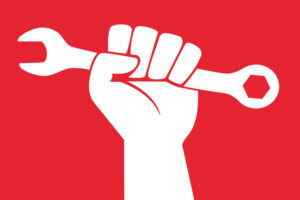 A DRAWING OF A WHITE ARM AND BALLED UP FIST HOLDING A WHITE WRENCH IN FRONT OF A RED BACKGROUND.