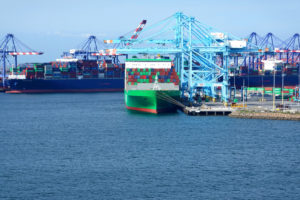 A CONTAINER SHIP IS BEING UNLOADED AT THE PORT OF LOS ANGELES.