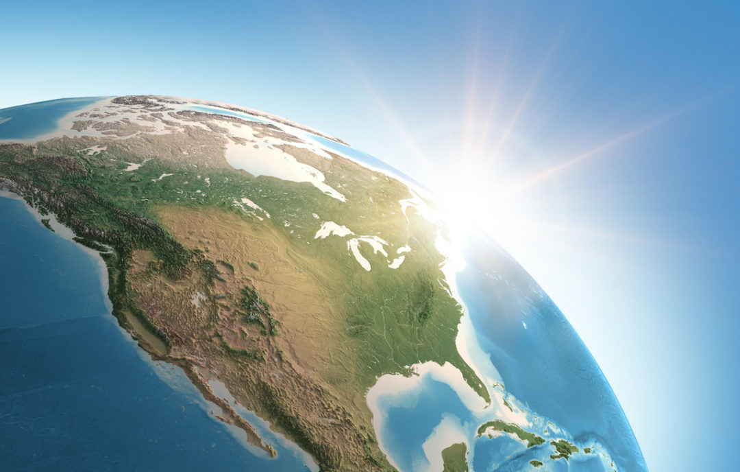 3D ILLUSTRATION OF A GLOBAL VIEW OF THE SUN SHINING OVER NORTH AMERICA.