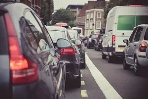 A TRAFFIC JAM TAKES PLACE ON A LONDON STREET.