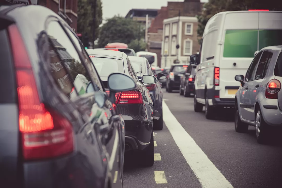 A TRAFFIC JAM TAKES PLACE ON A LONDON STREET.