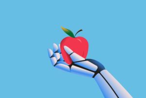 A ROBOTIC HAND HOLDS UP A SHINY RED APPLE