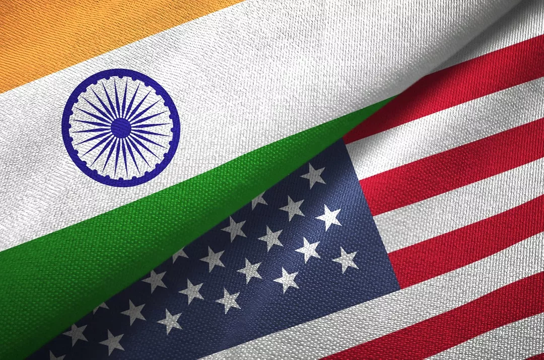 THE FLAGS OF THE US AND INDIA ARE FOLDED TO MEET