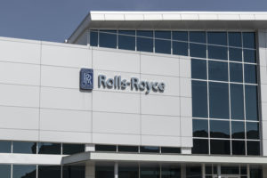 ROLLS-ROYCE LOGO ON THE OUTSIDE OF AN OFFICE BUILDING.
