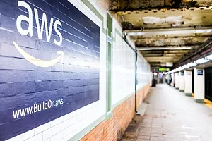 AN AMAZON WEB SERVICES ADVERTISEMENT POSTED ON THE WALL OF A NEW YORK CITY SUBWAY STOP.