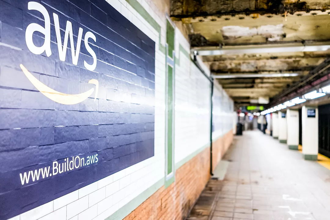 AN AMAZON WEB SERVICES ADVERTISEMENT POSTED ON THE WALL OF A NEW YORK CITY SUBWAY STOP.