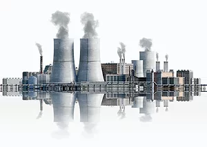 3D RENDERING OF A TWIN REACTOR NUCLEAR POWER PLANT IN FRONT OF A WHITE BACKGROUND.