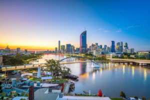 THE BRISBANE RIVER AND CITY SKYLINE AT TWILIGHT.