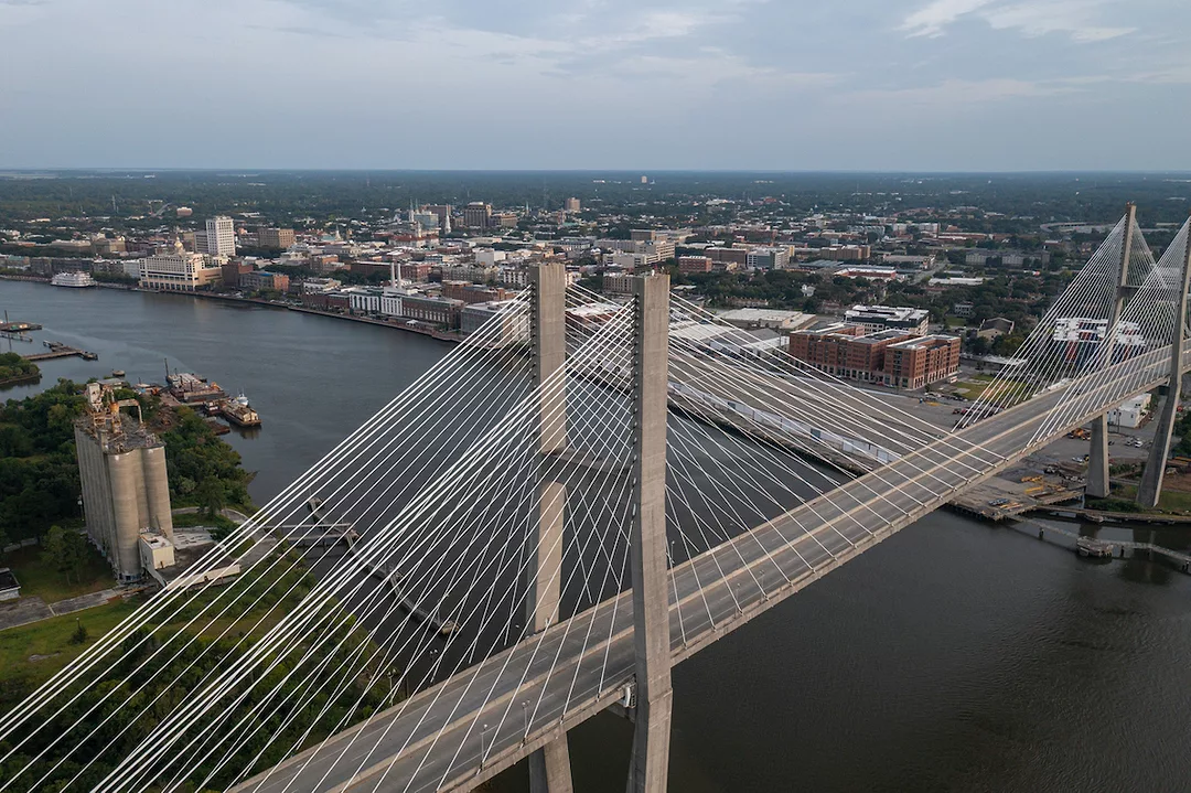 AN AERIAL VIEW OF THE SAVANNAH, GEORGIA RIVERFRONT AND THE EUGENE TALMADGE MEMORIAL BRIDGE.