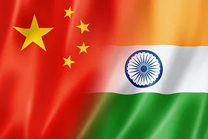 THE FLAG OF CHINA BLENDS INTO THE FLAG OF INDIA.
