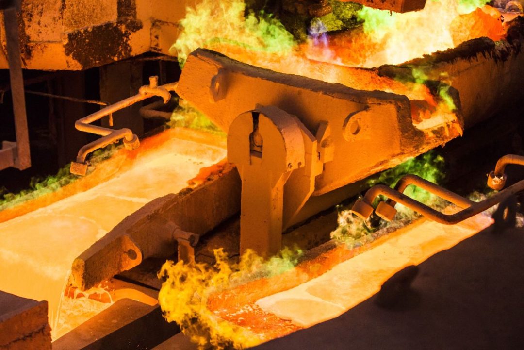 MOLTEN COPPER BEING PROCESSED AT A METALS PLANT.