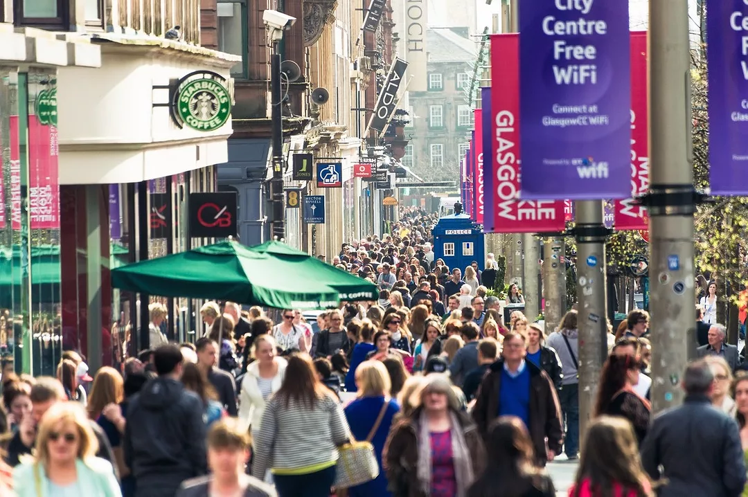 A CROWDED PEDESTRIAN SHOPPING STREET