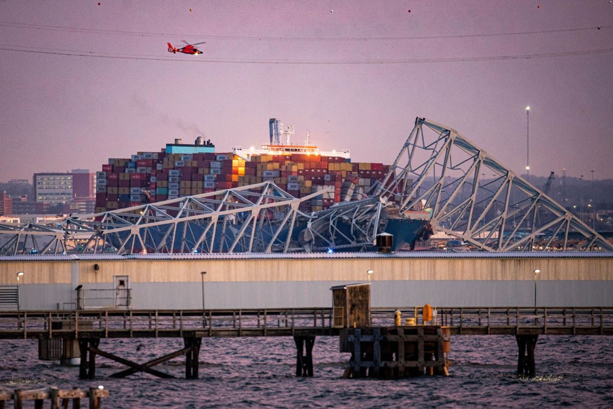 Baltimore bridge a u.s. coast guard helicopter flies over the dali container vessel after it struck the francis scott key bridge in baltimore maryland u.s. on march 26. bloomberg