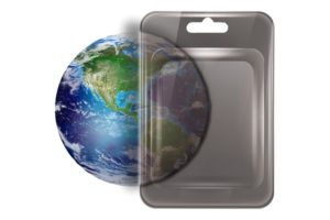 A PLASTIC PACKAGE THROWS A SHADOW OVER AN IMAGE OF THE EARTH.