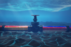 An underwater gas pipeline along an ocean floor