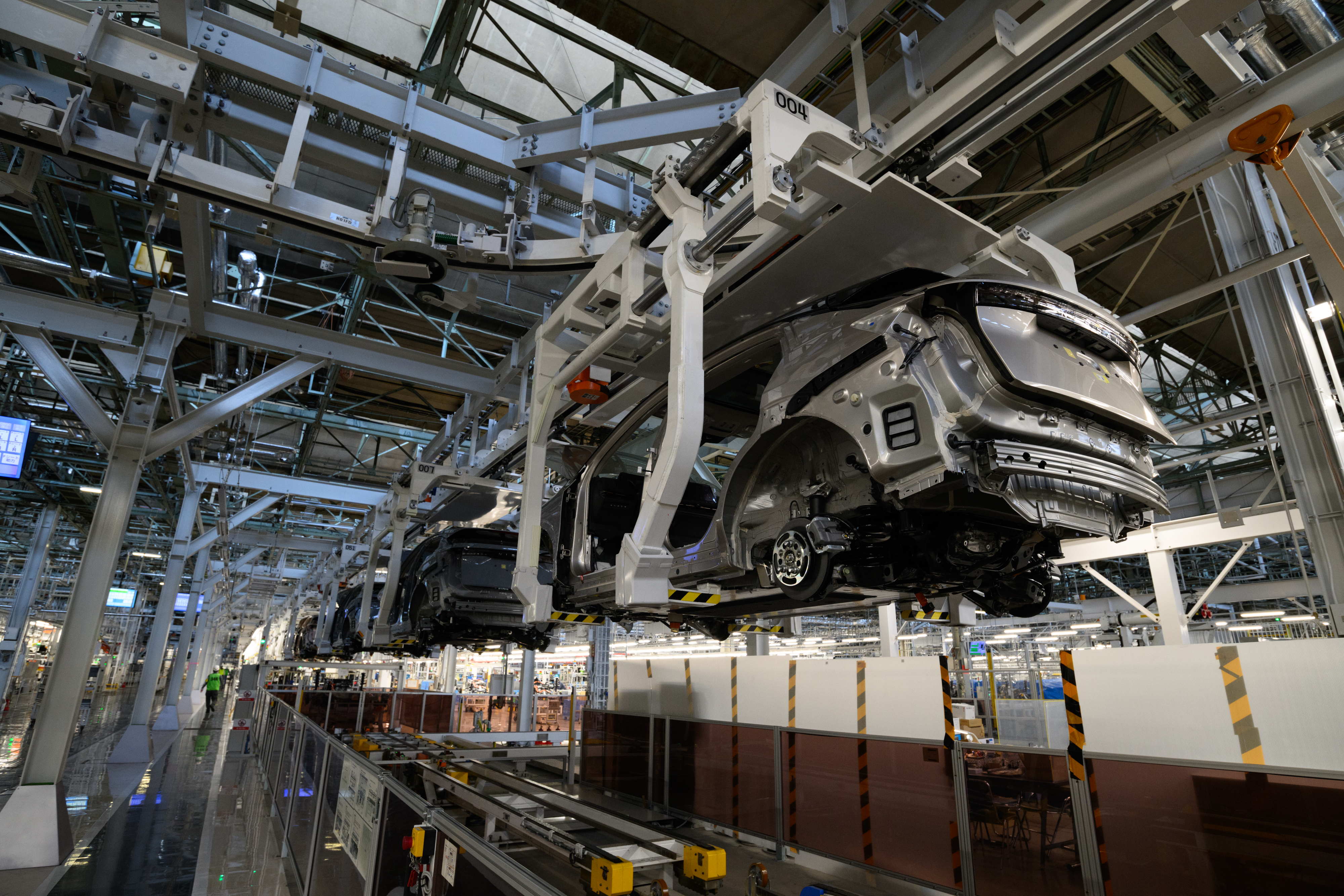 A Nissan crossover EV in a manufacturing facility